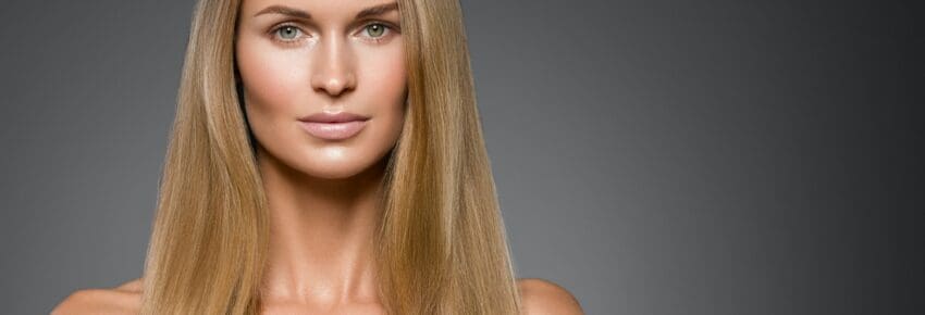 Beauty woman face healthy beautiful skin and blond smooth hair