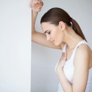 Chest pain. Stroke Infarct. Strong painful sensations. The concept of health. On a gray background