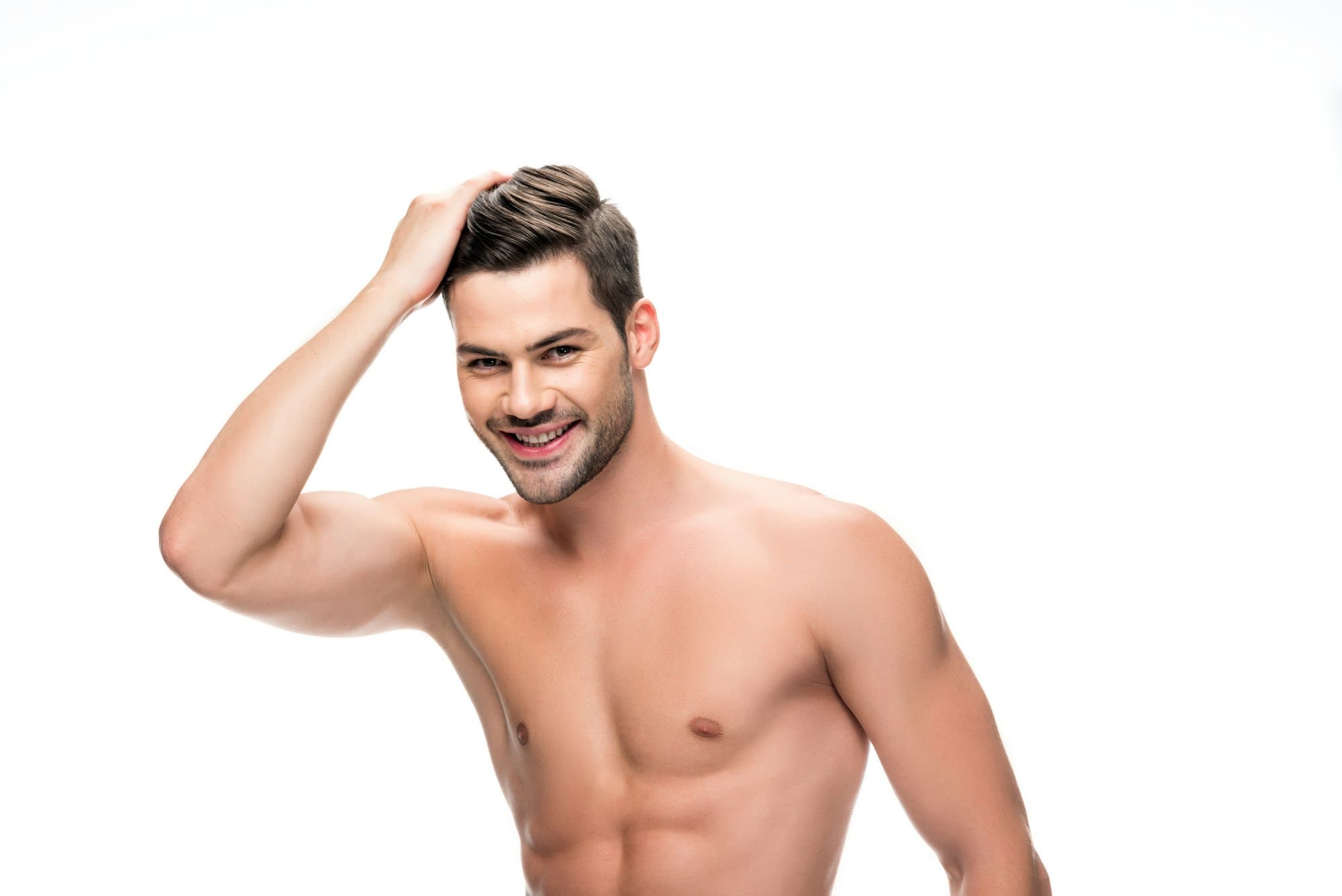 handsome shirtless man touching his hair isolated on white